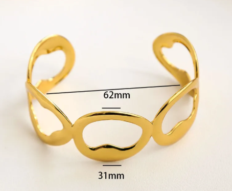 Pulso de círculos grande. Color dorado.