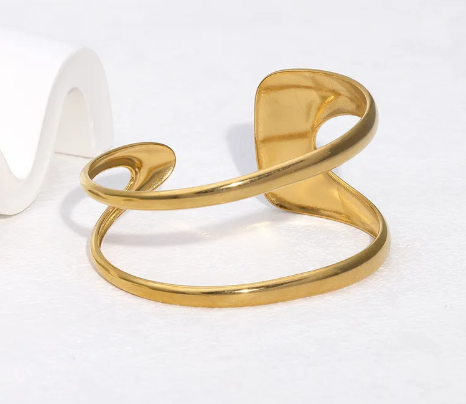 Pulso doble, rígido. Color dorado.